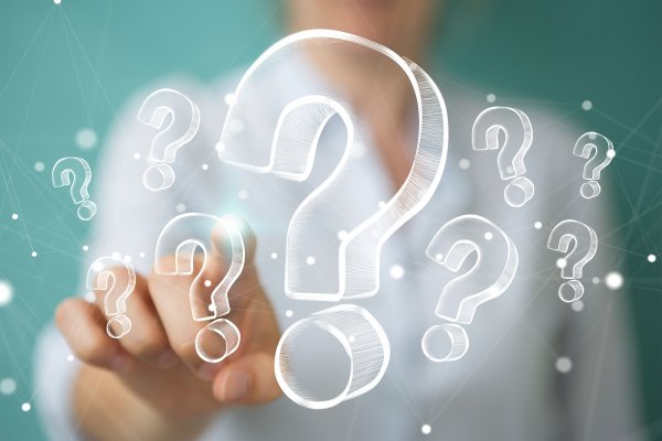 restoro system optimizers woman in white shirt touching question mark signs